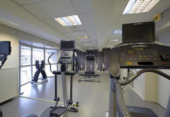 Citadines Les Halles Paris gym. Treadmills, elliptical trainers, and weights for a workout. Gay-friendly, pet-friendly hotel fitness center.