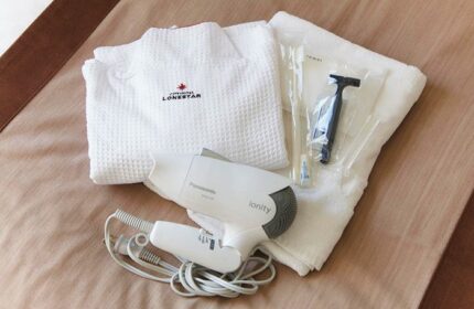 City Hotel Lonestar: Gay-friendly hotel room amenities. Bathrobe, towel, hair dryer, toothbrush, razor. Gay travel essentials.