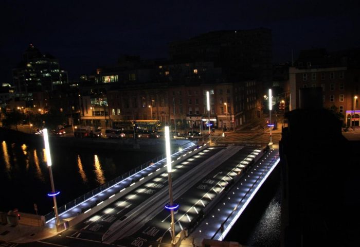 Night view from Clifton Court Hotel, a gay-friendly hotel. Dublin's illuminated bridge over the River Liffey, near the hotel. Cityscape.