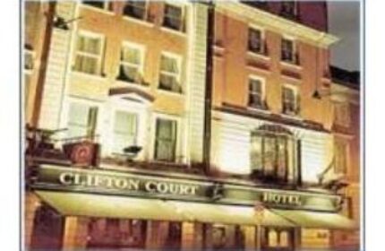 Clifton Court Hotel, a gay-friendly hotel. Building exterior with Clifton Court Hotel sign. Gay travel lodging option.