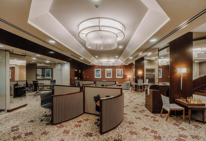 Club Quarters Hotel, Central Loop lobby. Gay-friendly hotel interior with chandeliers, work stations, and chess table.