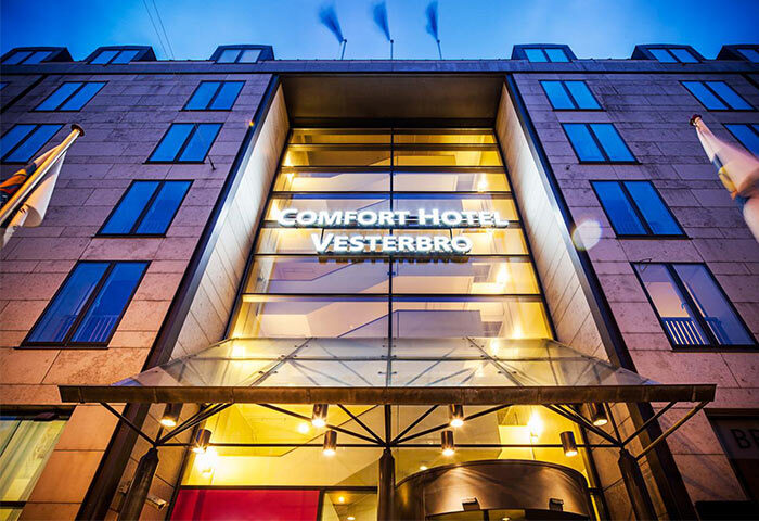 Comfort Hotel Vesterbro entrance. Gay-friendly hotel in Vesterbro, Copenhagen. Modern facade with glass and stone. Hotel for gay travelers.