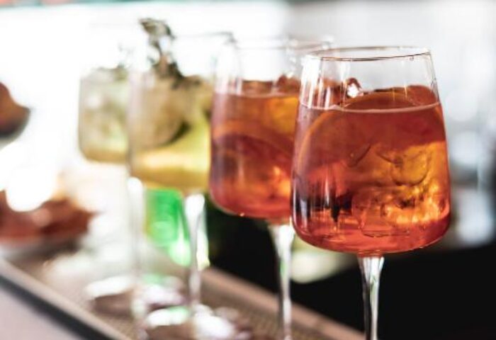 Condominio Monti Boutique Hotel: Cocktails lined up at the bar. Gay-friendly hotel with a stylish atmosphere. Perfect for gay travel in Rome.