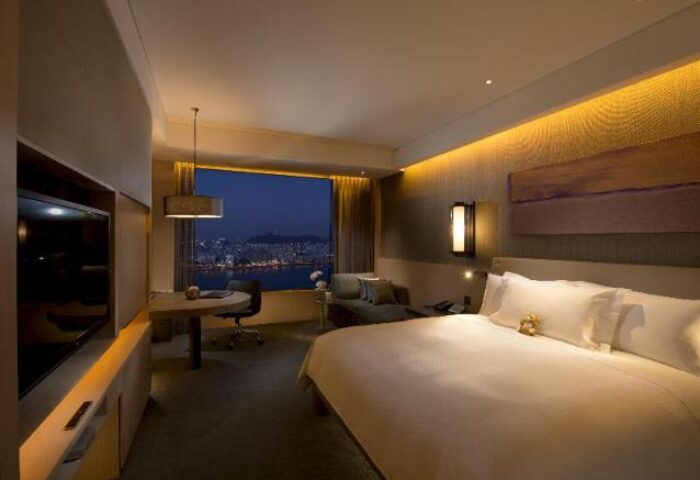 Conrad Seoul hotel room with city view. Gay-friendly hotel offers luxurious accommodations, modern amenities, and stunning views for gay travelers.