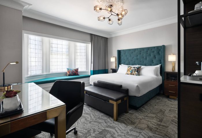 Courtyard San Francisco Downtown/Van Ness Ave gay-friendly hotel room. King bed, desk, and window seat in a modern, well-lit room.
