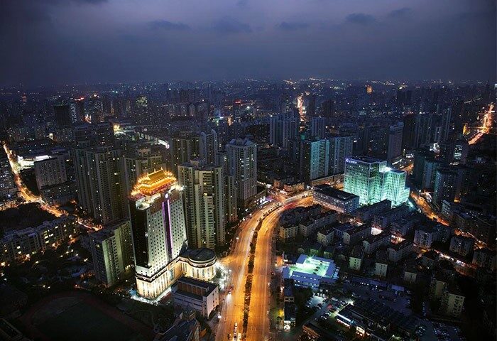 Night view of Shanghai Xujiahui, featuring the Courtyard by Marriott. A gay-friendly hotel with city lights. Great for gay traveler's advice.