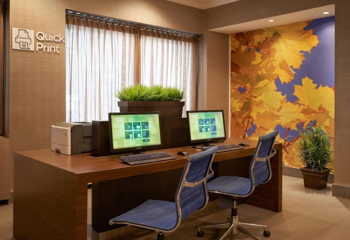 Courtyard by Marriott Toronto Downtown business center. Computers, printer, and office chairs. Gay-friendly hotel for Toronto travel advice.