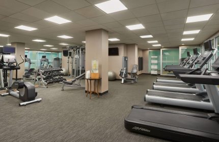 Courtyard by Marriott Toronto Downtown's gym. Gay-friendly hotel with treadmills, weights, & fitness equipment for a healthy stay.