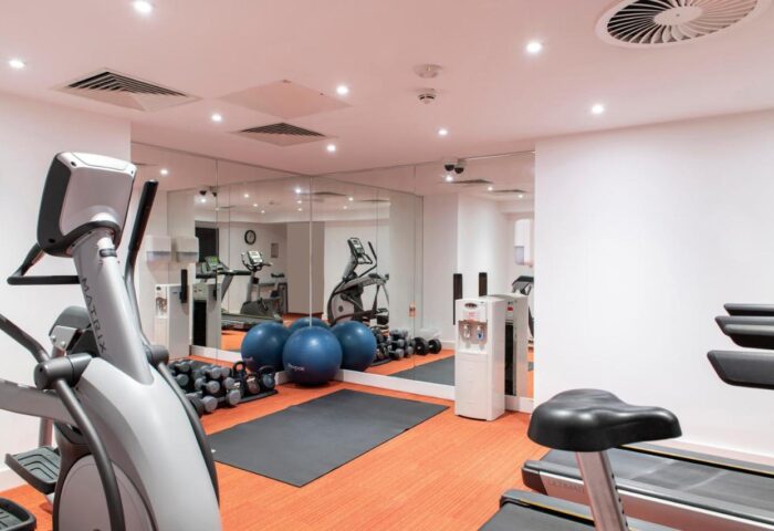 Cove Minshull Street's gym. This gay-friendly hotel features fitness equipment, including treadmills, elliptical, weights, and exercise balls.