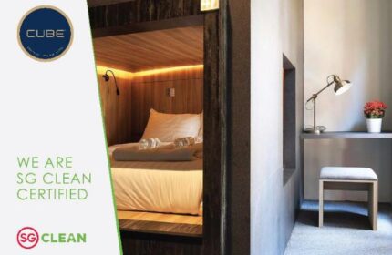 Cube Boutique Capsule Hotel @ Chinatown: Interior view of a gay-friendly capsule with bed, desk, and stool. SG Clean Certified.