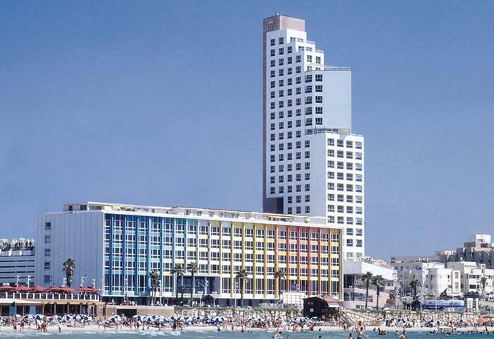 Dan Tel Aviv Hotel, a gay-friendly hotel. Beachfront view of the hotel, a popular destination for gay travelers in Tel Aviv, Israel.