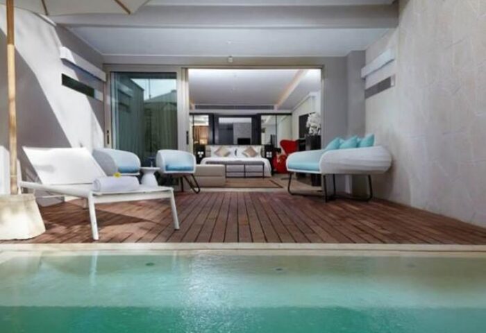Double-Six Luxury Hotel Seminyak room with pool. Gay-friendly hotel, offers stylish accommodations for LGBTQ+ travelers in Seminyak, Bali.