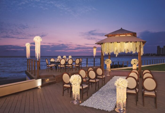 Dreams Vallarta Bay Resort & Spa wedding setup. All-inclusive, gay-friendly hotel with ocean view. Romantic destination for gay couples.