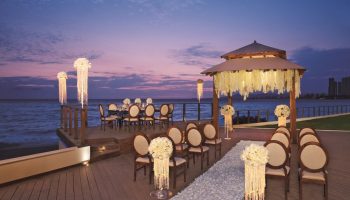Dreams Vallarta Bay Resort & Spa wedding setup. All-inclusive, gay-friendly hotel with ocean view. Romantic destination for gay couples.