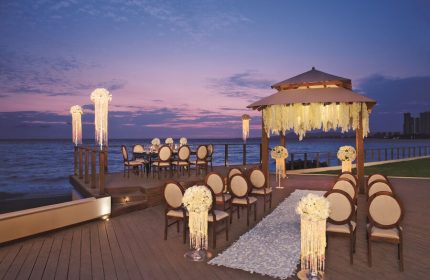 Dreams Vallarta Bay Resort & Spa wedding setup. All-inclusive, gay-friendly hotel with ocean view. Romantic destination for gay couples.