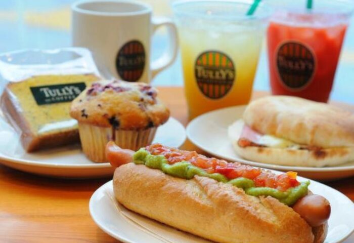 Tully's coffee, hot dog, sandwich, muffin, and drinks at E-Hotel Higashi Shinjuku, a gay-friendly hotel in Tokyo. Perfect for a quick bite.