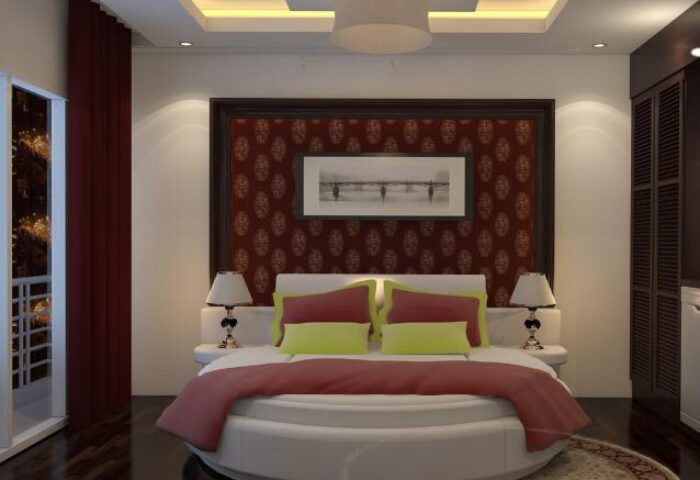 Eclipse Legend Hotel's gay-friendly room: Round bed, red accents, modern design. Perfect for gay men's travel. Stylish, comfortable stay.