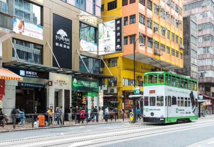 Eco Tree Hotel, Hong Kong. Gay-friendly hotel with a tram in front. The Eco Tree Hotel is a great choice for gay travelers.