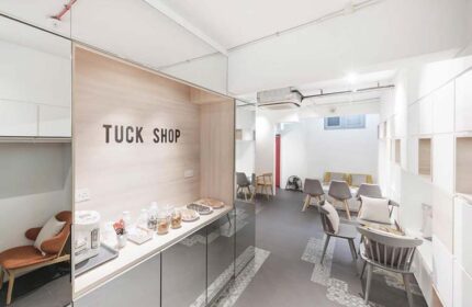 Eighteen By Three Cabins' Tuck Shop. The gay-friendly hotel offers a lounge area with snacks and seating for guests. Modern design.