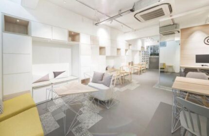 Eighteen By Three Cabins interior. Modern design, light wood tables and chairs. Gay-friendly hotel, stylish, comfortable, and welcoming.