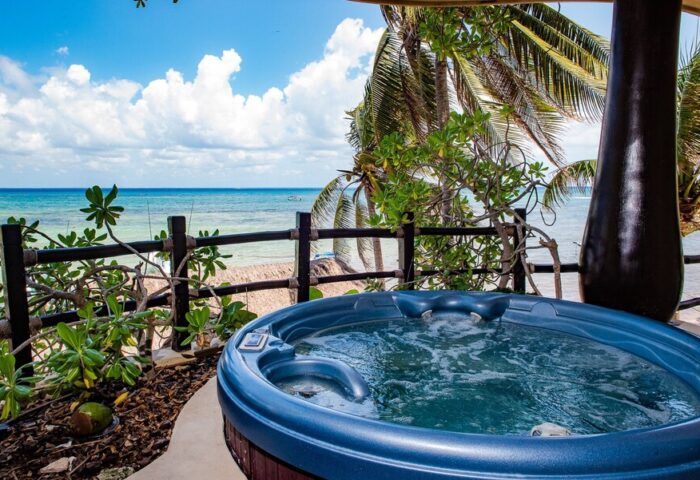 El Taj Oceanfront Condo Hotel hot tub with ocean view. Gay-friendly beachside hotel in Playa del Carmen for gay men's travel.