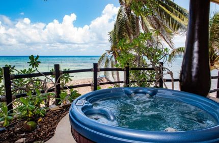 El Taj Oceanfront Condo Hotel hot tub with ocean view. Gay-friendly beachside hotel in Playa del Carmen for gay men's travel.