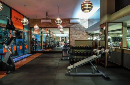 El Taj Oceanfront Condo Hotel's gym. Weights, machines, and hanging lights. Gay-friendly hotel in Playa del Carmen.