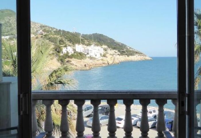 View from a room at Estela Barcelona, a gay-friendly hotel. Balcony overlooking the Mediterranean sea. Coastal hotel.