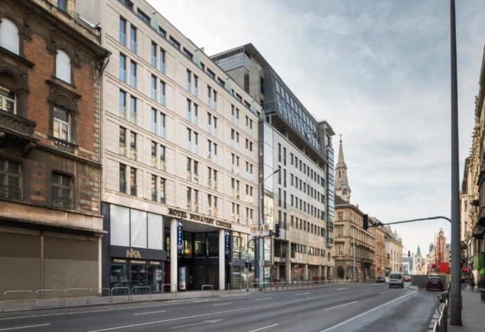 Eurostars Budapest Center, a gay-friendly hotel. Modern building facade on a city street. Great location for gay travel in Budapest.