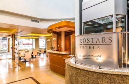 Eurostars Zona Rosa Suites lobby. Gay-friendly hotel in Mexico City's Zona Rosa, featuring a reception desk and dining area.