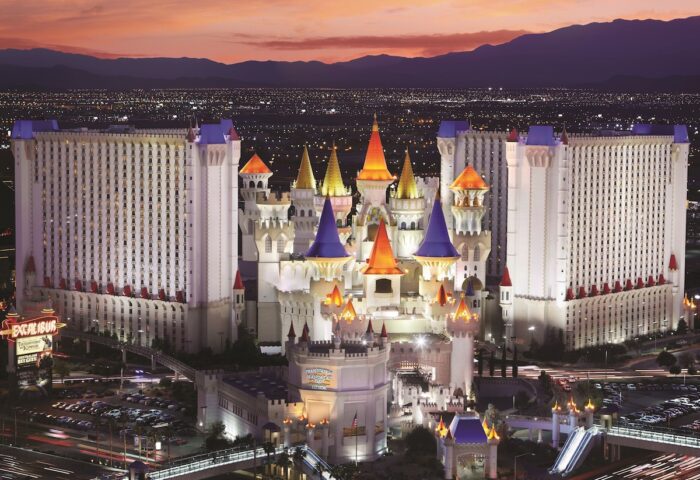 Excalibur Hotel, a gay-friendly hotel in Las Vegas, Nevada. The hotel is designed like a medieval castle with colorful spires.