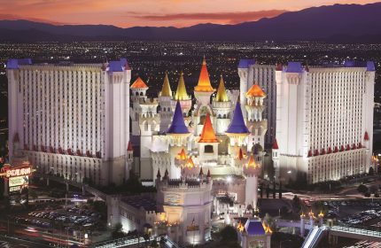 Excalibur Hotel, a gay-friendly hotel in Las Vegas, Nevada. The hotel is designed like a medieval castle with colorful spires.