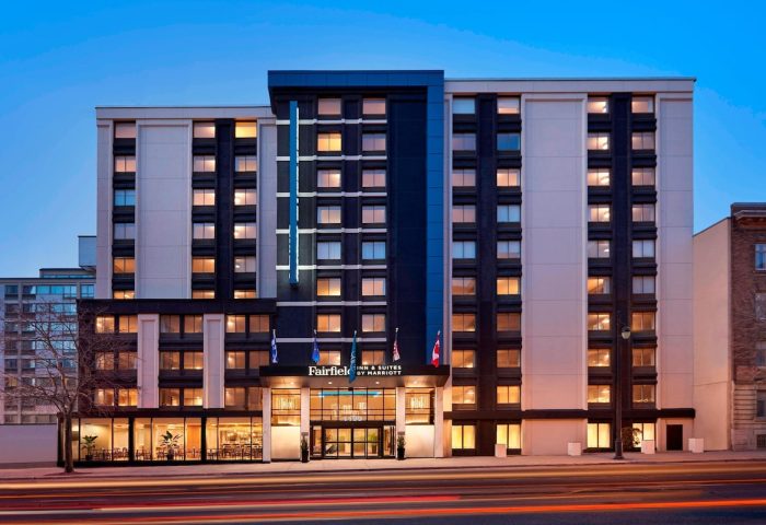 Fairfield by Marriott Montreal Downtown, a gay-friendly hotel. Modern building exterior at dusk, ideal for gay travelers.