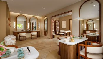 Fairmont Mayakoba's gay-friendly spa. Interior with vanity mirrors and seating. A luxury travel destination for gay men seeking relaxation.