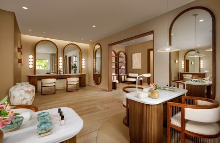 Fairmont Mayakoba's gay-friendly spa. Interior with vanity mirrors and seating. A luxury travel destination for gay men seeking relaxation.