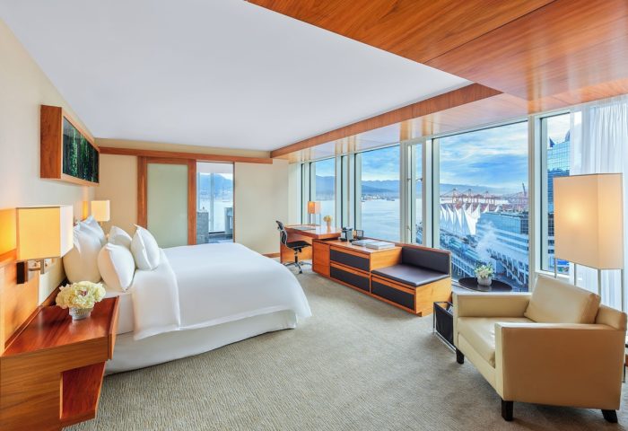 Fairmont Pacific Rim Hotel room. Gay-friendly hotel with city & harbor views. Luxury suite, modern design. Ideal for gay travel in Vancouver.