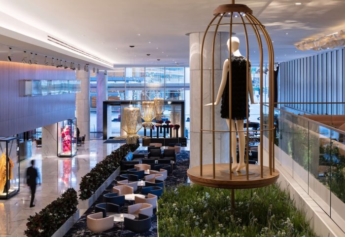 Fairmont Pacific Rim Hotel lobby. A gay-friendly hotel with a mannequin in a birdcage. Modern design, luxury travel, Vancouver.