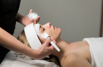 Fairmont The Queen Elizabeth Hotel spa facial. A woman relaxes while receiving a facial treatment at this gay-friendly hotel in Montreal.