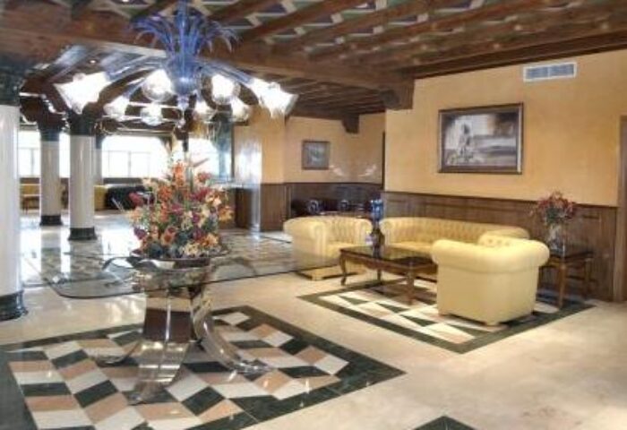Fenix Torremolinos Adults Only Hotel lobby. Gay-friendly recommended hotel with stylish interior, seating area, and elegant decor.