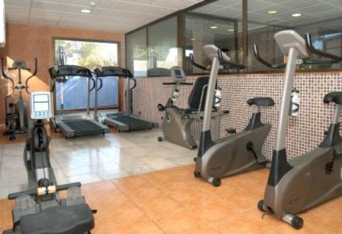 Fenix Torremolinos Adults Only Hotel gym. Gay-friendly hotel fitness center with treadmills, stationary bikes, and rowing machine. Recommended.