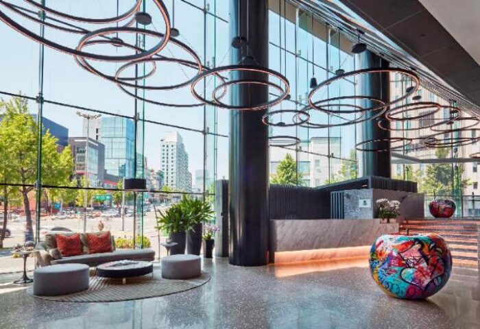 Four Points by Sheraton Seoul, Gangnam lobby. Gay-friendly hotel with modern design, city view, and artistic decor. Seoul travel advice.