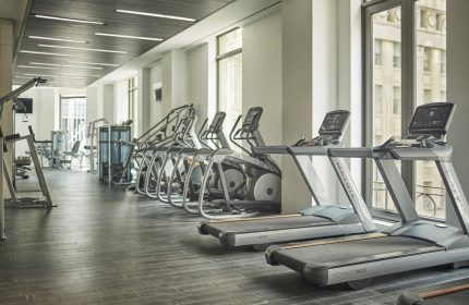 Four Seasons Hotel New York Downtown gym. Treadmills and elliptical machines in the fitness center of this gay-friendly hotel.