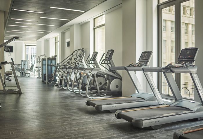 Four Seasons Hotel New York Downtown gym. Treadmills and elliptical machines in the fitness center of this gay-friendly hotel.