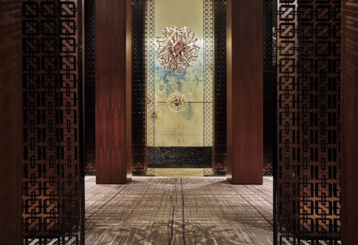 Interior of the Four Seasons Hotel Toronto at Yorkville, a gay-friendly hotel. Modern design with artistic details.