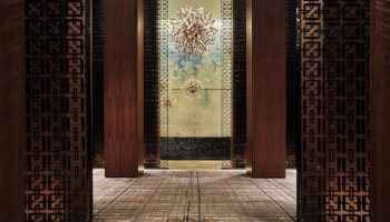 Interior of the Four Seasons Hotel Toronto at Yorkville, a gay-friendly hotel. Modern design with artistic details.