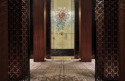 Interior of the Four Seasons Hotel Toronto at Yorkville, a gay-friendly hotel. Modern design with artistic details.