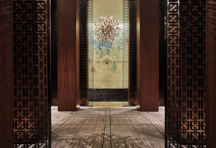 Interior of the Four Seasons Hotel Toronto at Yorkville, a gay-friendly hotel. Modern design with artistic details.