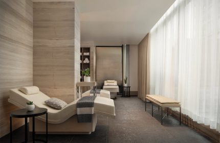 Four Seasons Hotel Toronto at Yorkville spa. Gay-friendly hotel with massage beds, soft lighting, and neutral tones for relaxation.