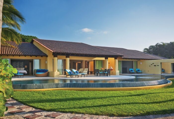 Four Seasons Resort Punta Mita: Gay-friendly hotel villa with private pool, patio, and luxurious outdoor seating. Perfect for gay travel.