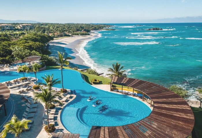 Four Seasons Resort Punta Mita aerial view. Gay-friendly hotel with pools, beach, and ocean. Ideal gay travel destination.